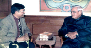 Professor Rajiv K. Saxena presenting the Geeta Kavya Madhuri to the Prime Minister Atal Bihari Vajpeyee (Year 2002)