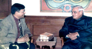 Professor Rajiv K. Saxena presenting the Geeta Kavya Madhuri to the Prime Minister Atal Bihari Vajpeyee (Year 2002)
